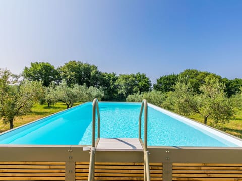 Blue, Swimming Pool, Composite Material, Shade, Eco Hotel, Resort, Outdoor Furniture, Leisure Centre