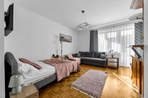 Living Area with Queen Bed, Sofa Bed and Smart TV | Book Now with RENTUJEMY.COM