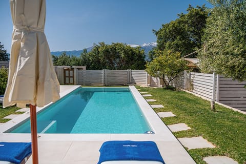 Pool & snow capped mountains
