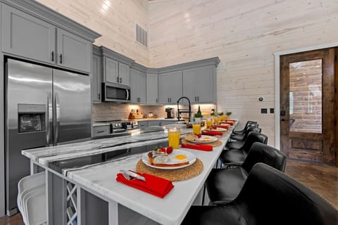 Start your day right in this stunning chef’s kitchen—where breakfast is served with style.