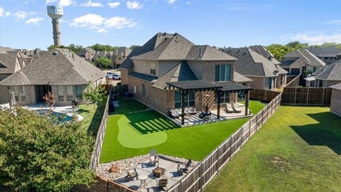 Welcome to your own private retreat - unwind under the shaded pergola, sink some putts on the green, or gather around the fire pit for unforgettable evenings. Your perfect getaway starts here!