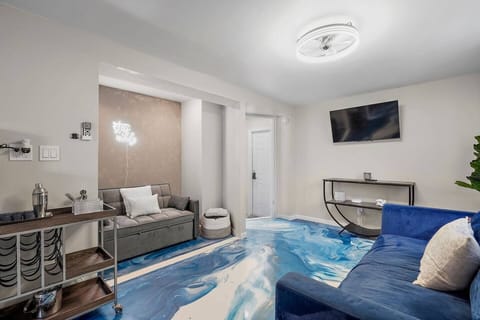 Living Room with smart tv, a sleeper sofa & Standard couch