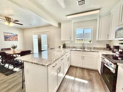 Whip up you favorite meals in the fully stocked kitchen (no dishwasher)