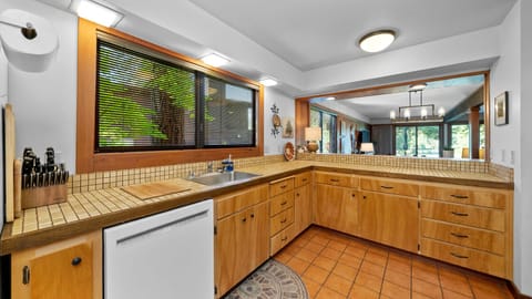 Kitchen opens to dining area