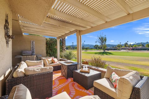 Patio View With Plenty Of Outdoor Seating and Firepit