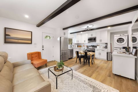 Living room leads to the dining and kitchen. Enjoy a comfortable also convenient living space.