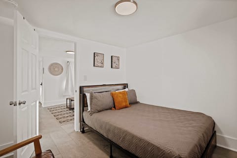 Relax and recharge in this inviting bedroom designed for ultimate comfort.