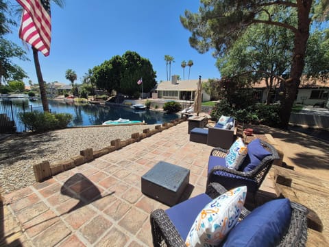 Spacious patio to relax and enjoy the lake view and sound of the waterfall!