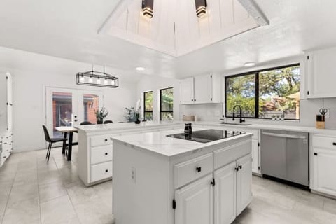 Kitchen: Bright and airy space with modern appliances and a view for culinary inspiration!
