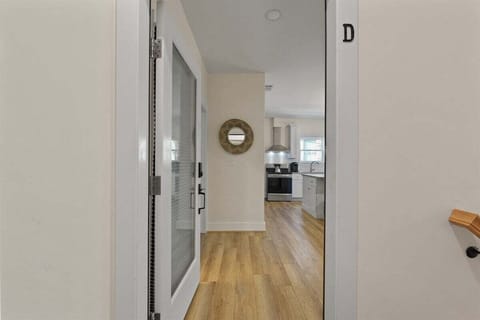 Step inside and feel right at home—this welcoming entry opens to your private upstairs retreat filled with comfort and charm.