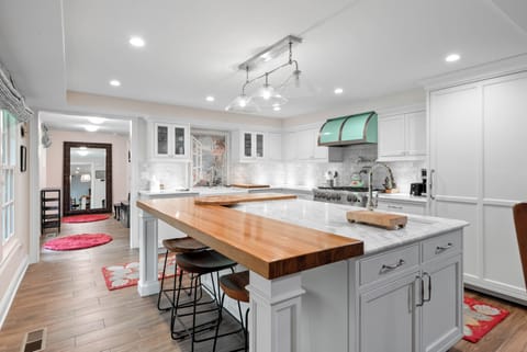 Large kitchen island with prep sink.