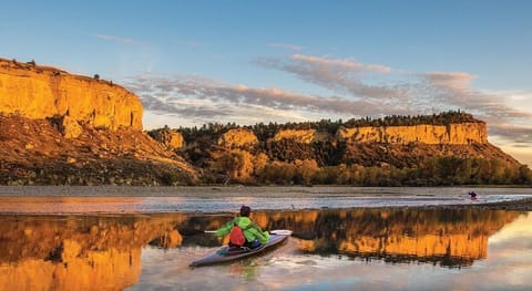 Paddle into golden-hour calm on scenic nearby waters.