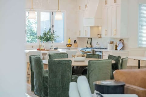 Bright, inviting, and built for gathering ☀️ This open-concept kitchen and dining space is the heart of the home—featuring high-end finishes, natural light, and plenty of room to cook, connect, and entertain.