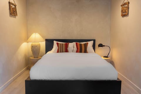 Queen bed room with vintage furniture