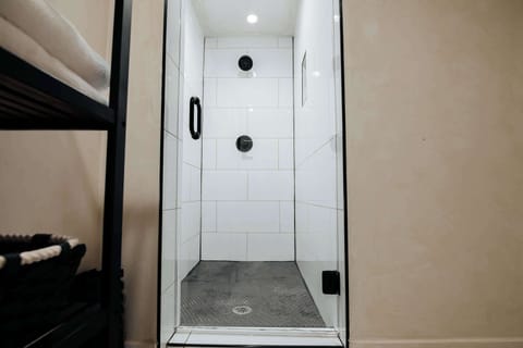 Full shower with hot water, body wash, shampoo and conditioner