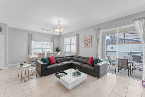 Living Room with Pool View!#Disney #Parks #kingdom #springs #StoreyLake #Apartment #Vacation #Rental #waterpark #Kissimmee #Orlando #universal #citywalk