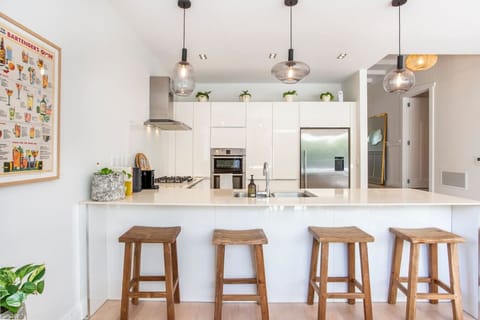 This home was built for you and your guests to enjoy. It is perfect for the self catering group, family, work colleagues. This kitchen is an entertainers dream because you have space and a multiple seating areas besides the dining table.