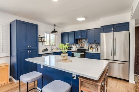 The large refrigerator has filtered water and an ice machine.