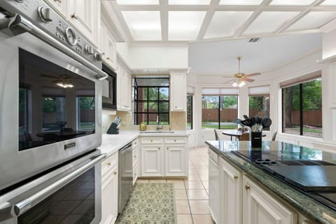 Kitchen Paradise: Sunlit space with premium appliances and inviting views for culinary adventures!
