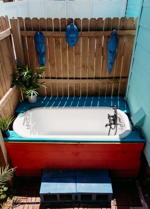 Outdoor tiki tub! Our vintage clawfoot tub makes for a lovely place to relax after a day on the river.