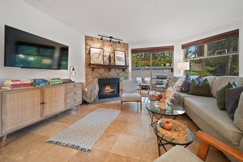 Spacious living area with Smart TV and a pull-out sofa bed for extra sleeping.