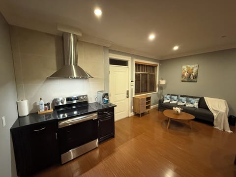 Overview of the entrance, cooking area and living area