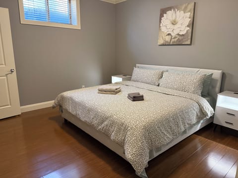 Bedroom 1 with King bed and closet