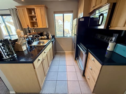 Well stocked kitchen with all of the extras needed for your short or long term stay needs.