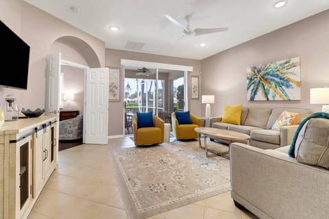 Large sliding glass doors give you a lovely view of the pool and and water behind the villa..