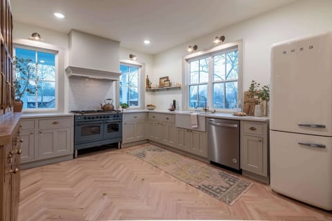 The kitchen - fully stocked kitchen with 5 burner Ilve (ilve) gas stove with griddle and oven, Smeg refrigerator and freezer, dishwasher, coffee maker, and more