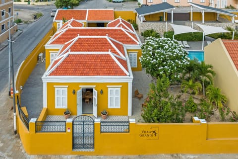 Stylish historic city villa with tropical courtyard garden, saltwater pool, and authentic charm in historic Otrobanda