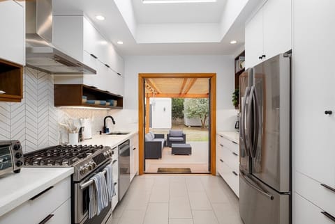 Kitchen view into backyard deck