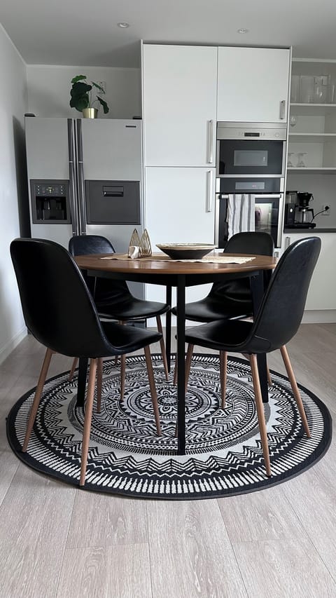 Stylish dining space with a modern touch — perfect for gathering and relaxing.