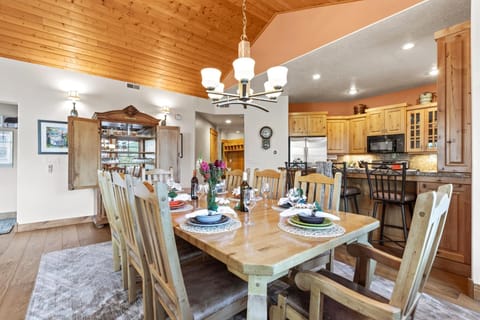 Share meals at the dining table for eight with natural wood finishes and mountain charm. TPC-301C
