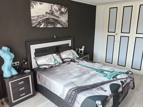 Master bedroom with Parisian chic. Facing the sandy mile beach and Montana Roja
