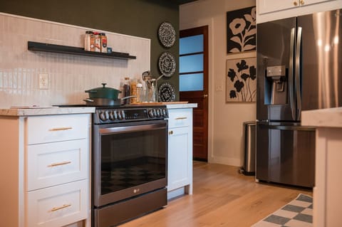 Full kitchen with appliances and essentials
