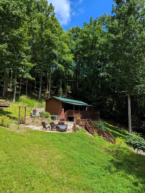 Exterior of cabin; parking area is down the stairs on the right