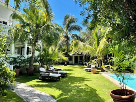 Kings Treat stands on King Street in a large walled garden with a swimming pool.