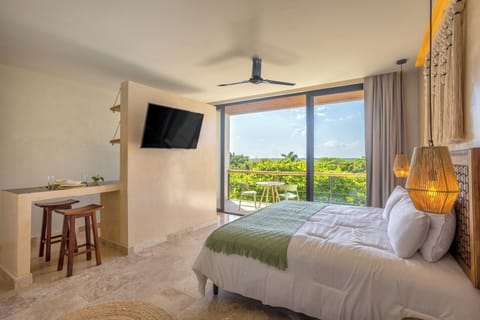 Habitacion con vista al aterdecer,  momentos magicos y tranquilidad total en este balcon. Cama king size mas sofacama individual perfecto para dos adultos y un menor