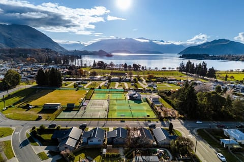 Panoramic mountain & lake views · Tennis courts directly across the road