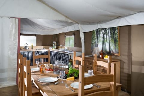 Open plan kitchen and dining table with seating for six