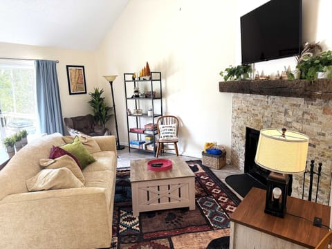 Beautiful Country Decor updated with Wood Fireplace and Stunning Mountain Views..  Smart TV as well