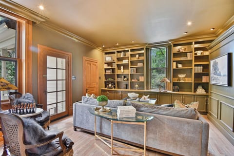 Reflect, read, play chess or fold down the murphy bed in the Library on the Main floor with period antiques and artifacts to explore.