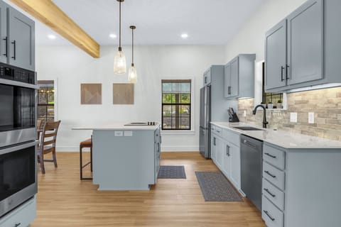 Full kitchen with stainless steel appliances