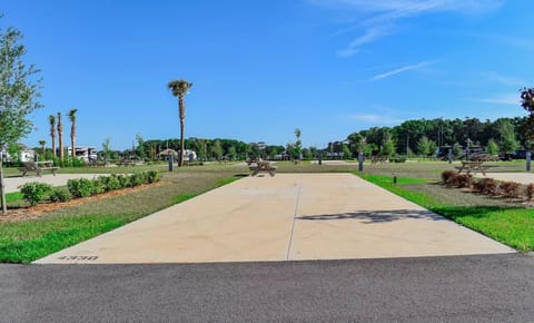 This is the actual site of the RV pad with full hookups and a picnic table.