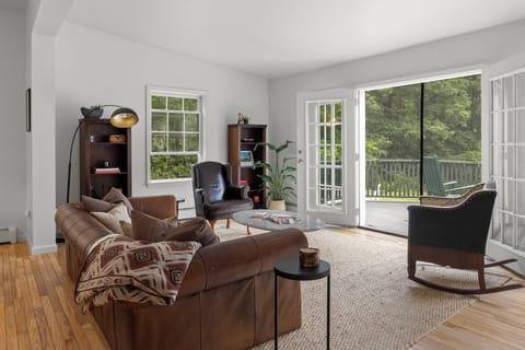 Bright & airy w/ doors opening to lush yard. Perfect for nights in or gatherings
