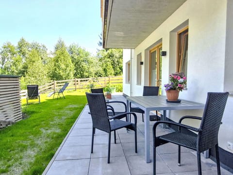 Furniture, Outdoor Furniture, Chair, Outdoor Table, Garden, Lawn, Shade, Hardwood, Landscaping, Yard