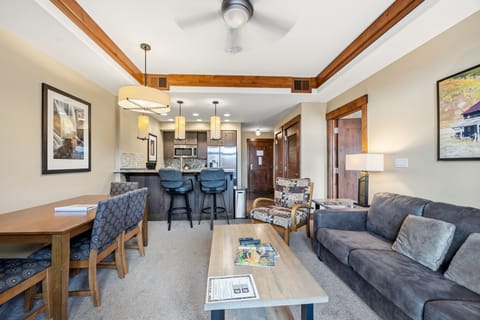 Open-plan living, dining, and kitchen in one continuous space.