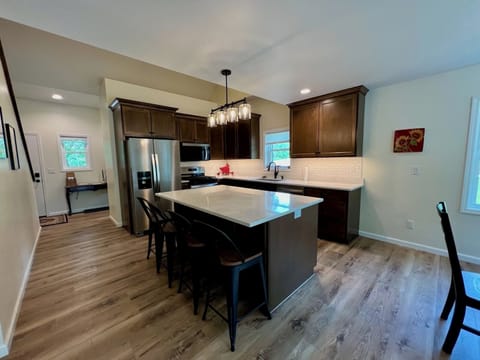 Kitchen island includes seating for 4 