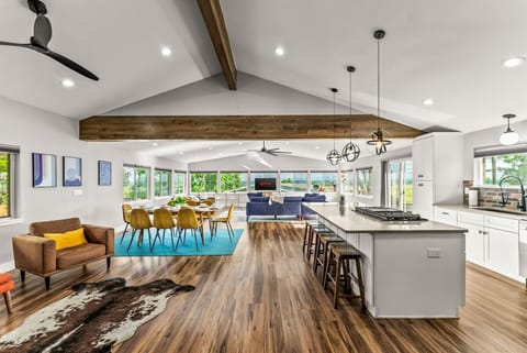 Spacious open floor plan with vaulted ceilings and panoramic mountain views